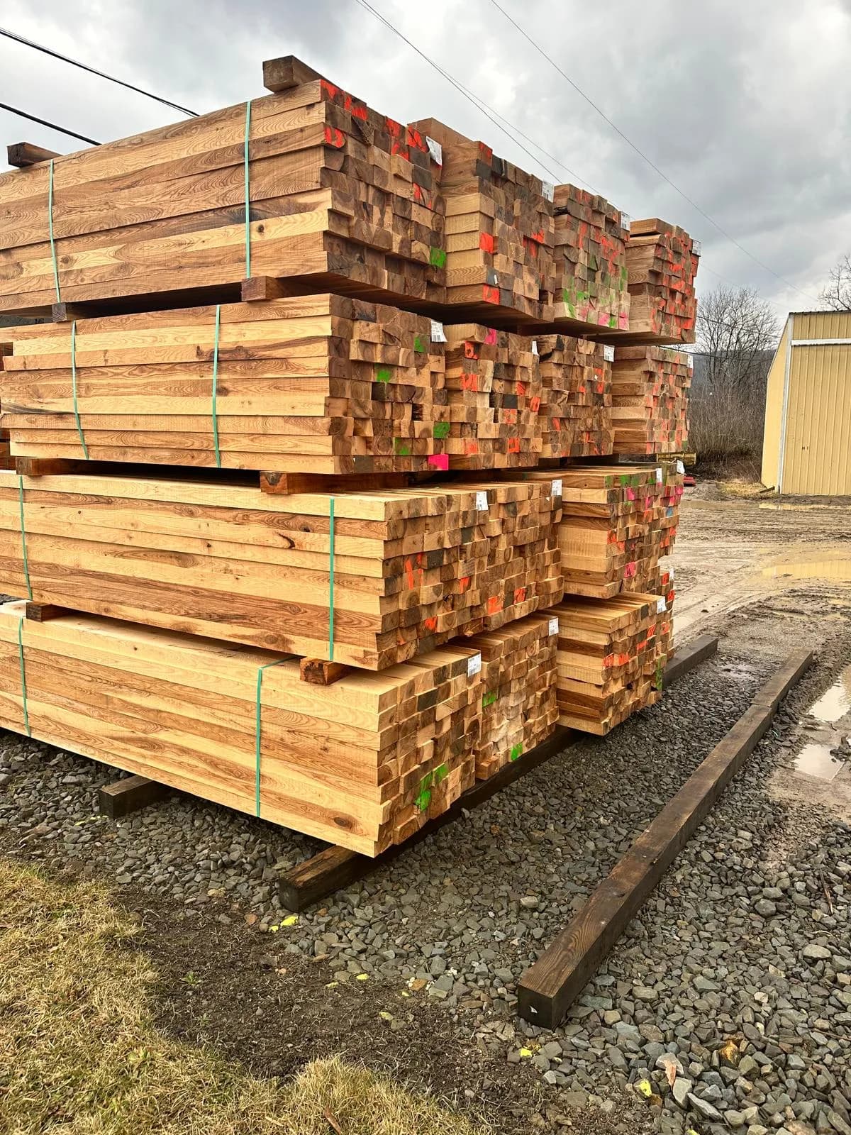 Deck lumber stockpile on job site — Buffalo NY