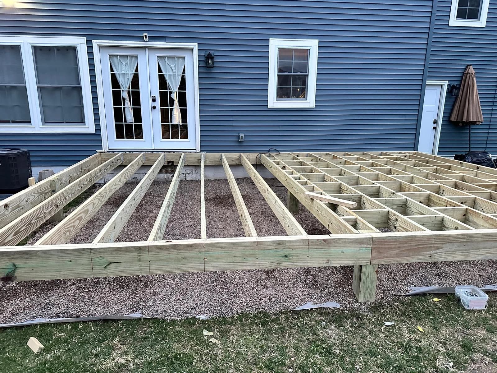 Deck frame structure from ground level — Buffalo NY