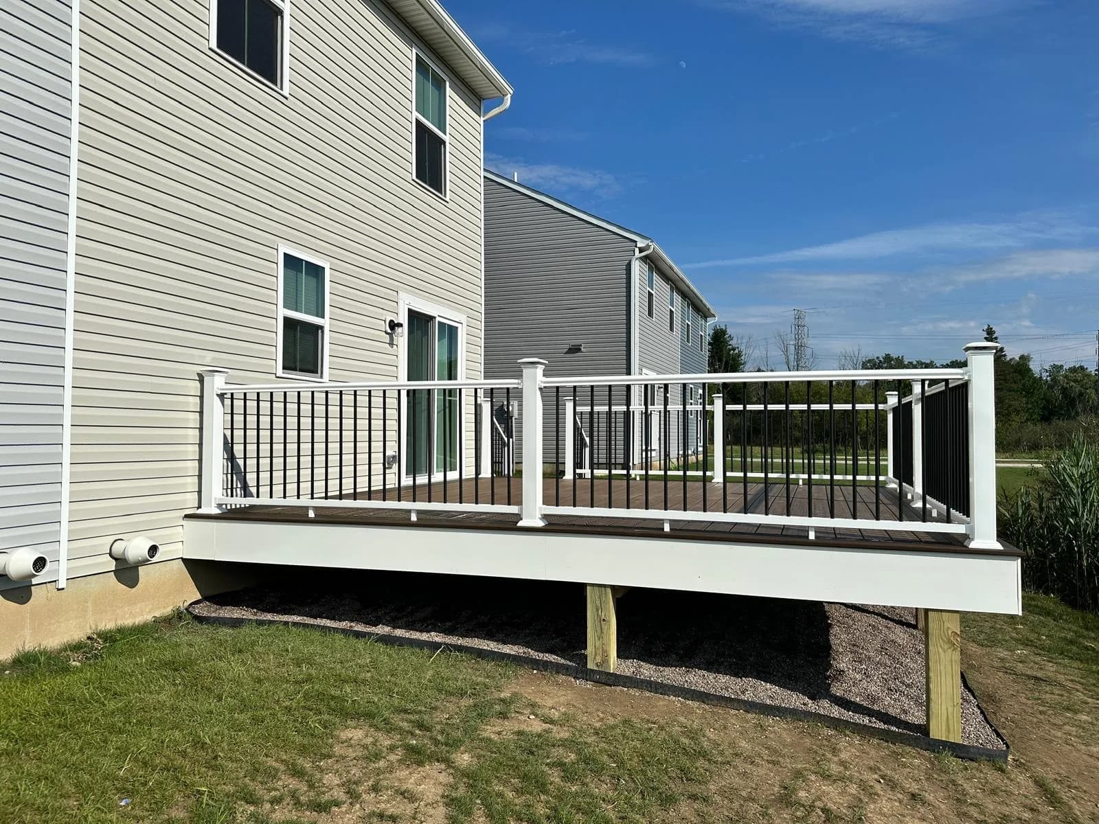 Raised deck black railing side angle — Buffalo NY