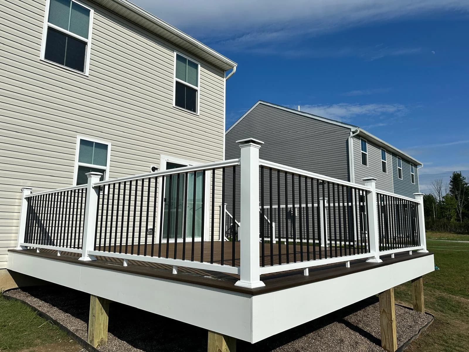 Raised deck black railing backyard view — Buffalo NY