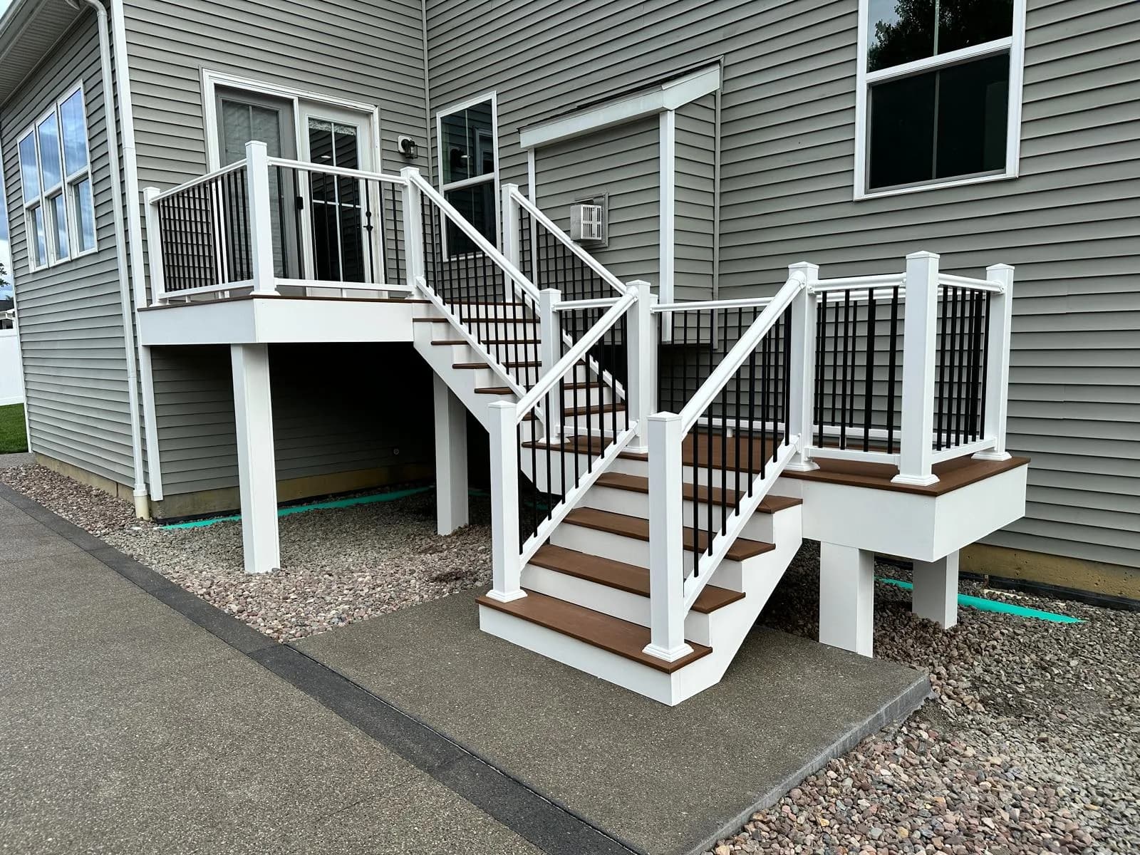 Raised composite deck front view with pool — Buffalo NY