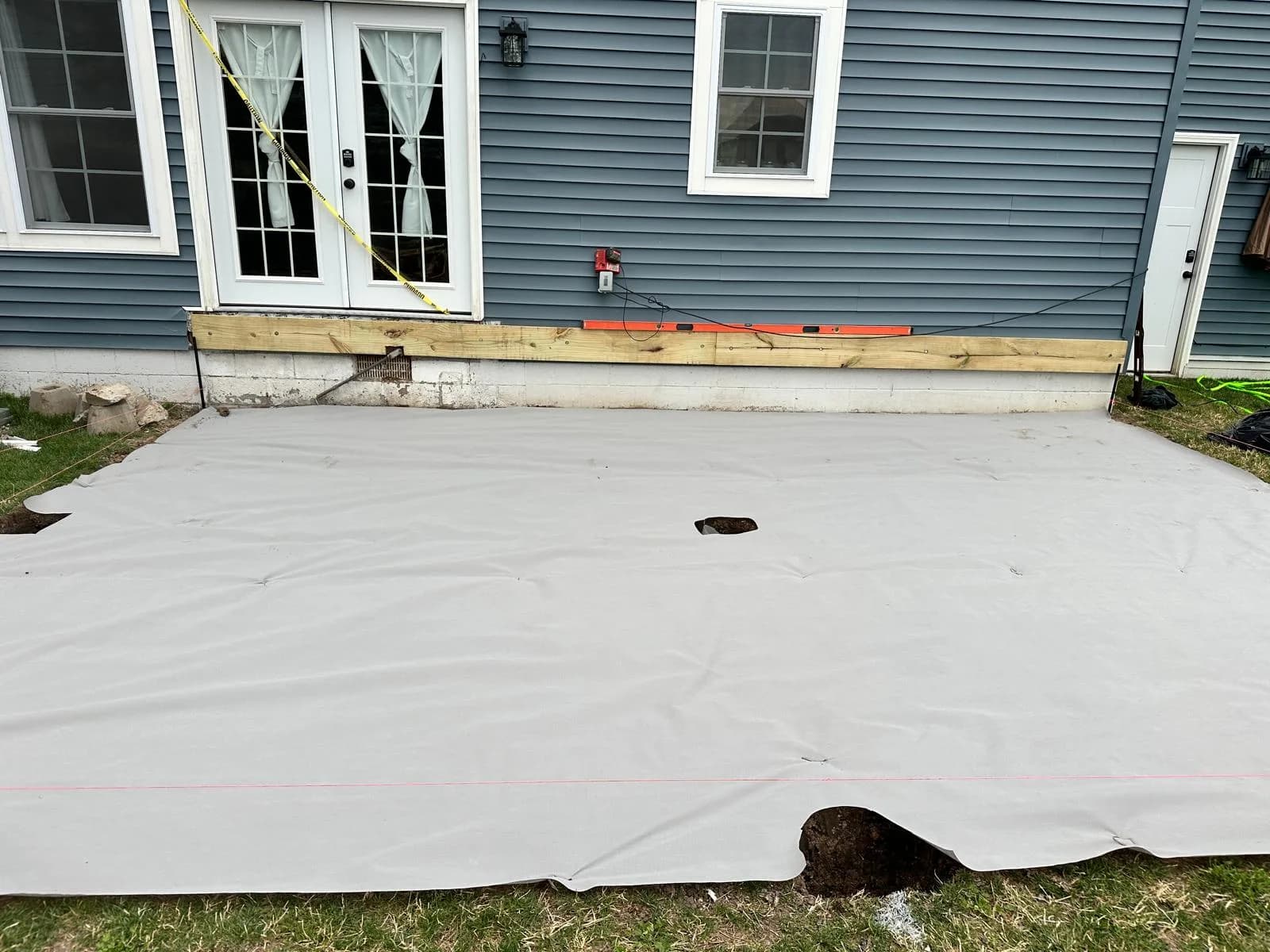 Under-deck drainage membrane installation — Buffalo NY