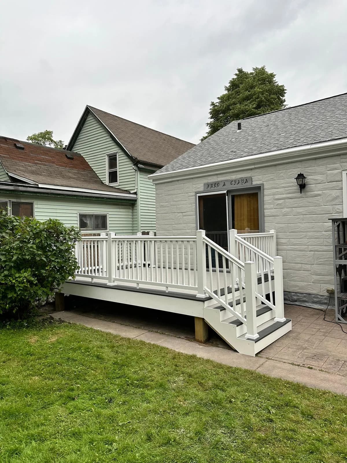 White composite deck yard view — Buffalo NY